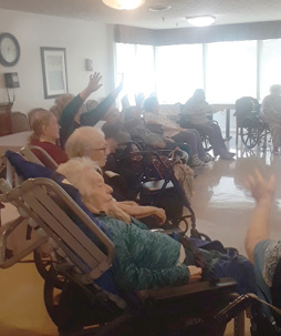 Residents participating in Moving and Grooving activity