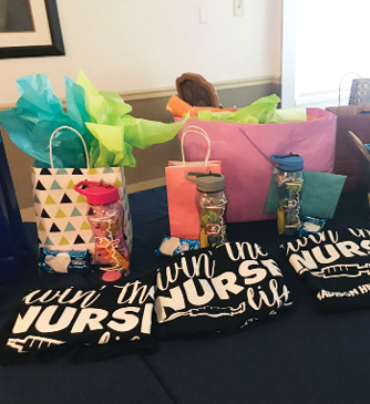 gift bags sitting on a table for nurses of Madison health and rehab