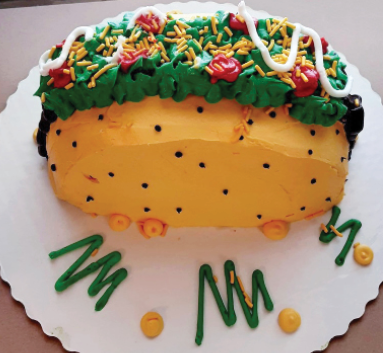 large cake decorated to resemble a Mexican taco