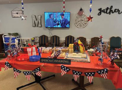 Table decorated for Veterans Day with treats and food